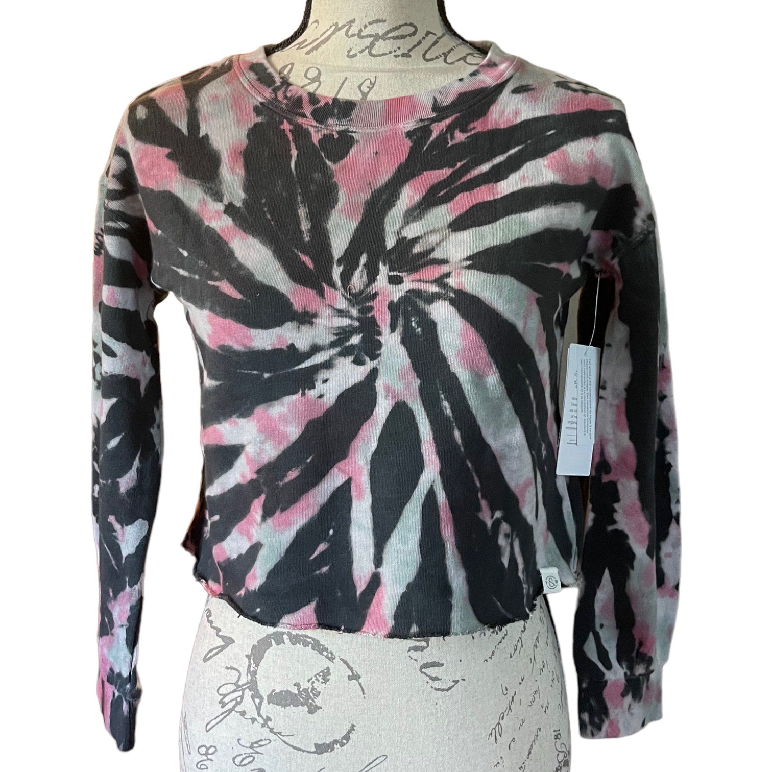 Front of Tie-dye long-sleeve shirt on a mannequin with a white background