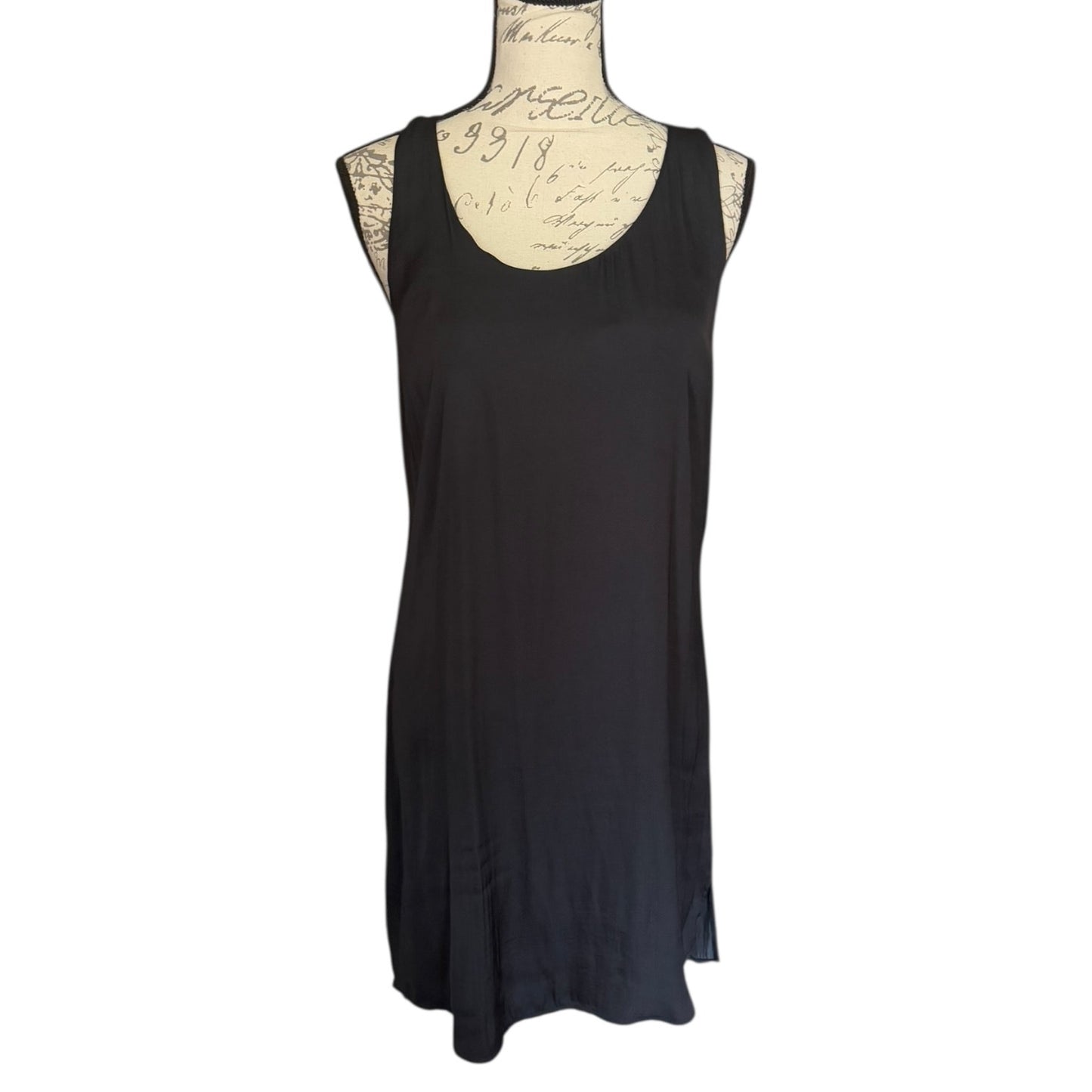 Front of Black sleeveless dress on a mannequin with a white background