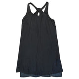 Black tank dress with thin straps on a white background