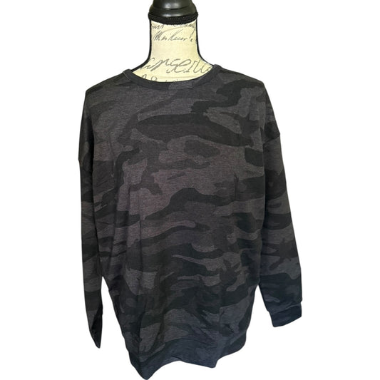 Front of Camouflage-patterned sweater on a mannequin against a white background