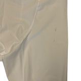 Close up of issue on pants on a white background