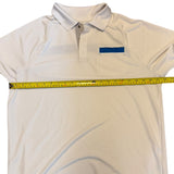 Pit to pit of white polo shirt