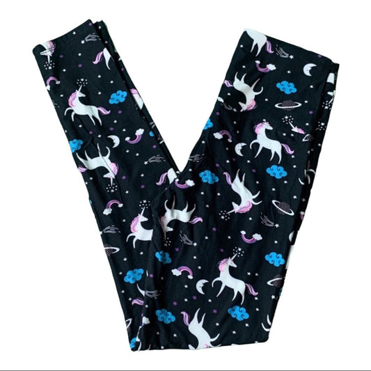 Black leggings with unicorn and rainbow pattern on a white background