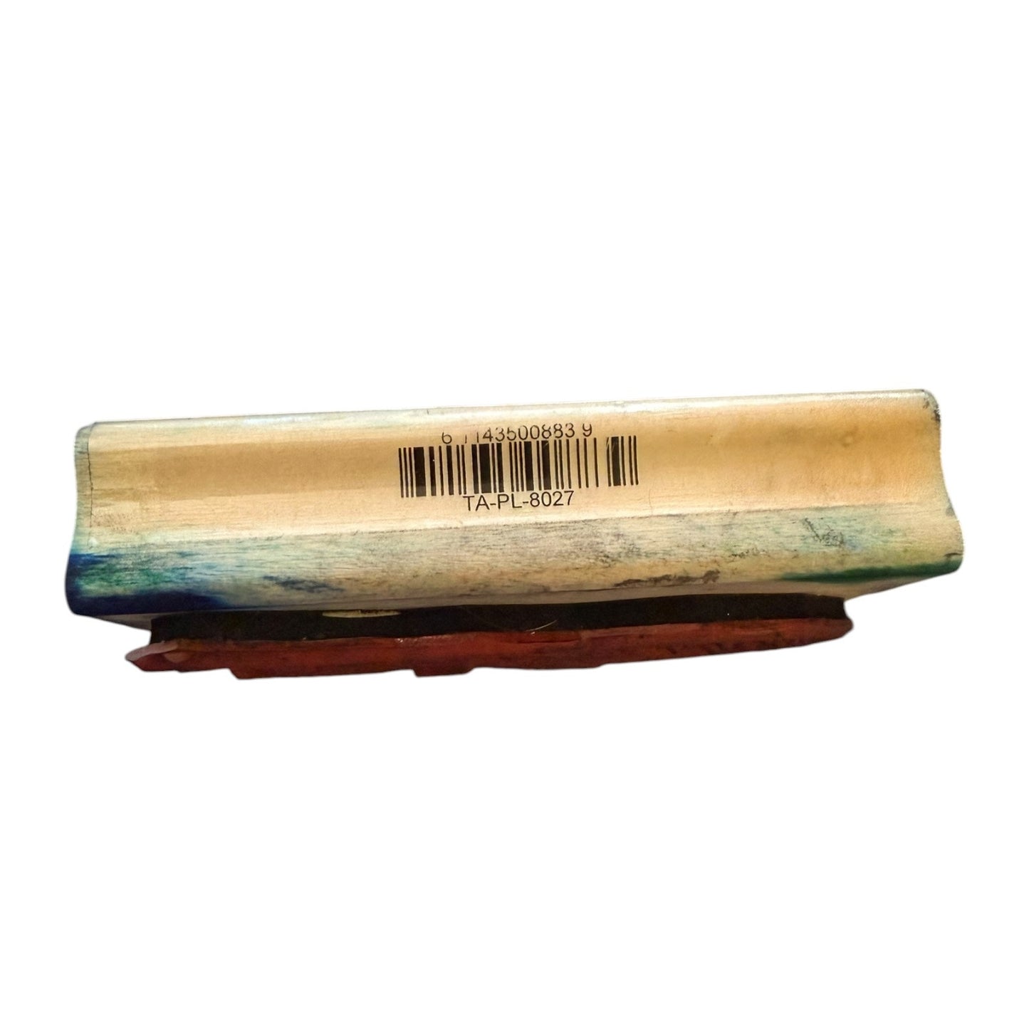 Wooden block with a barcode on a white background