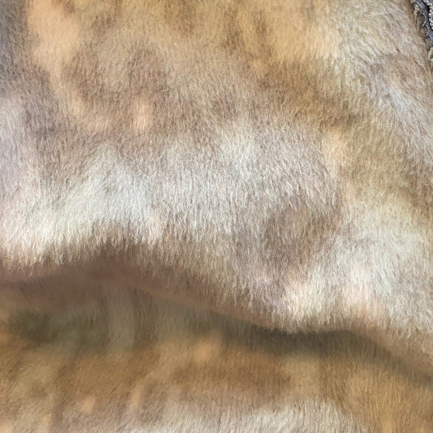 A close-up of a soft, textured print fabric 
