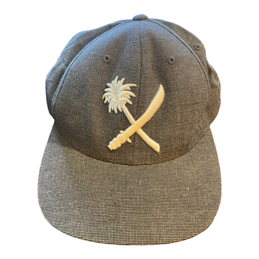 Front of Gray cap with a palm tree and crossbones design on a white background