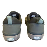 Back of a Pair of green sneakers with visible brand logo on a white background