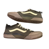 Side view of a Pair of green sneakers on a white background