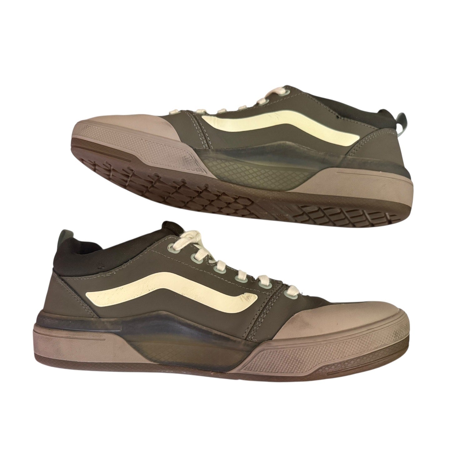 A pair of low-top skate shoes shown from the side and angled top views against a plain white background. 