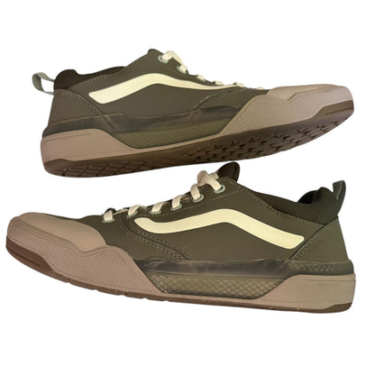 Side view of a Pair of green sneakers on a white background