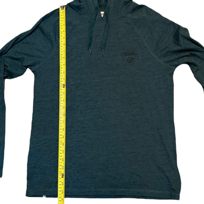 Green hoodie with a measuring tape on a white background