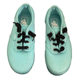 Front of green vans