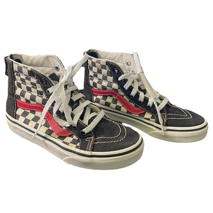 Front side of Pair of checkered high-top sneakers with red accents on a white background