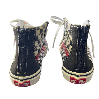 Back of Pair of checkered high-top sneakers with zippers on a white background