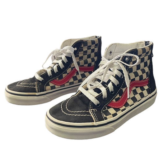 Front side of Pair of checkered high-top sneakers with red accents on a white background
