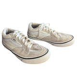 Front side of white Vans sneakers