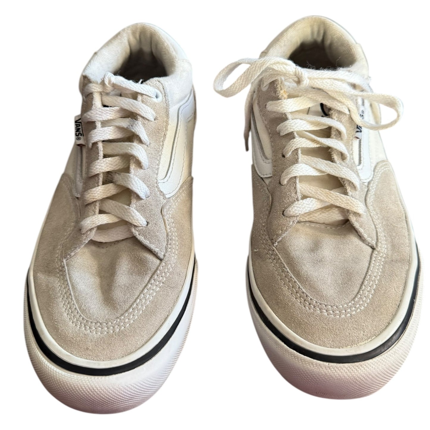 Front of white sneakers with white laces on a white background