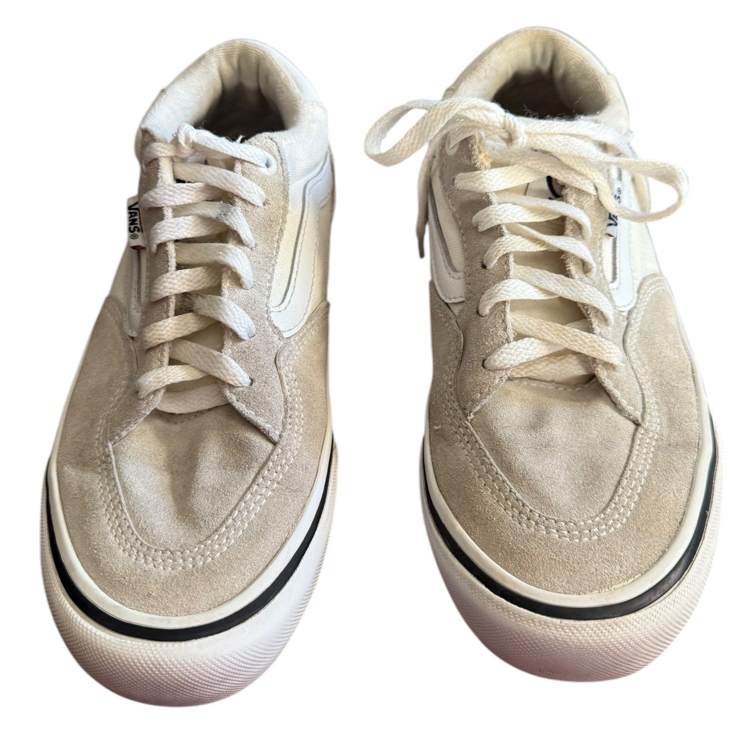 Front of white sneakers with white laces on a white background