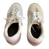 Top if white Vans