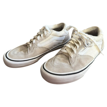 White Vans front side of sneakers with white laces on a white background