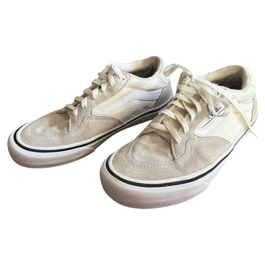 White Vans front side of sneakers with white laces on a white background