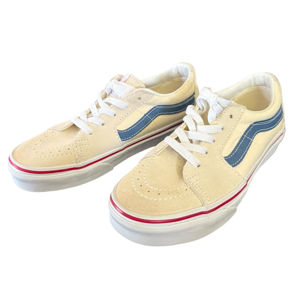 Pair of cream sneakers with blue and pink accents on a white background