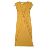 Yellow dress laying flat