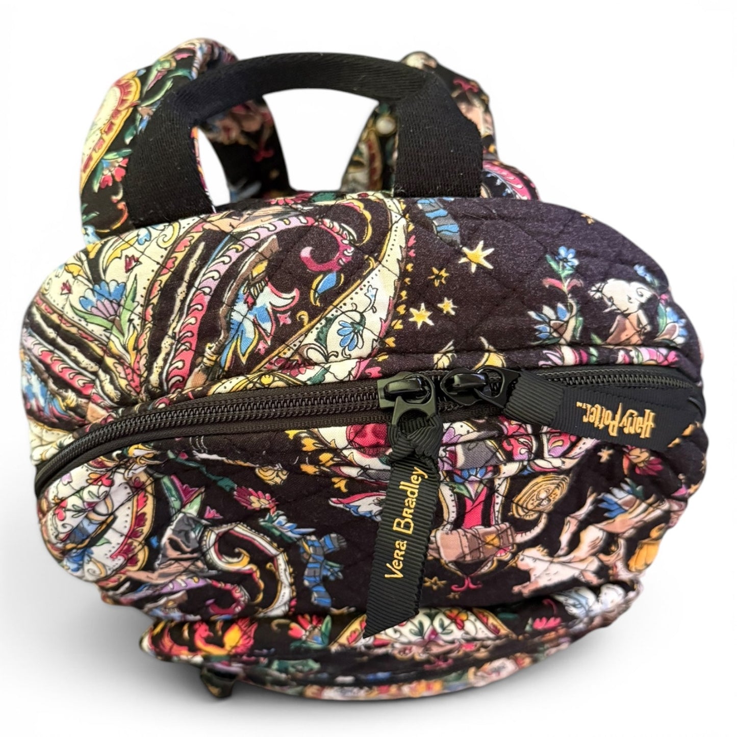 Top of Colorful patterned bag with a visible brand label on a white background