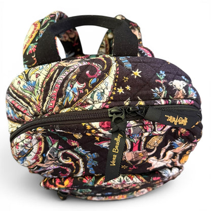 Top of Colorful patterned bag with a visible brand label on a white background