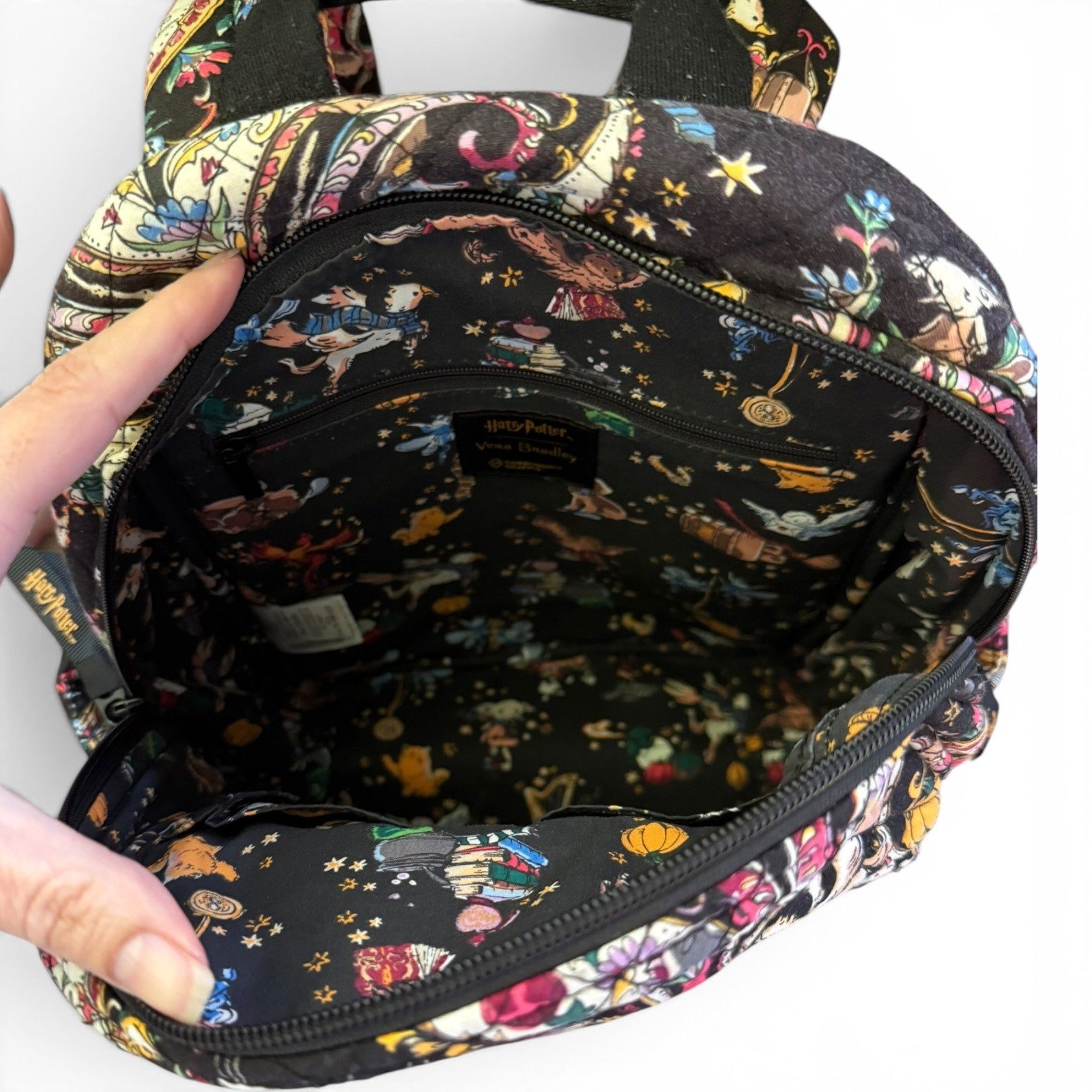 Backpack interior with colorful pattern on a white background
