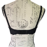 Back of black lace bra