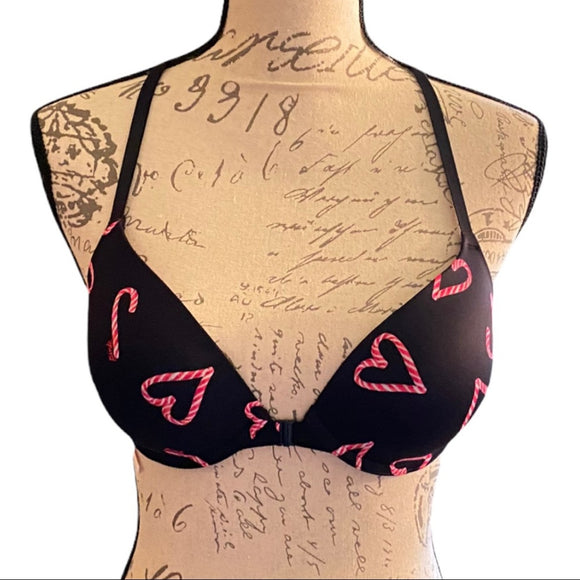 front of black with candy cane hearts bra
