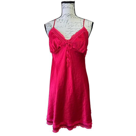 A red slip dress pajamas displayed on a vintage-style dress form mannequin against a plain white background.