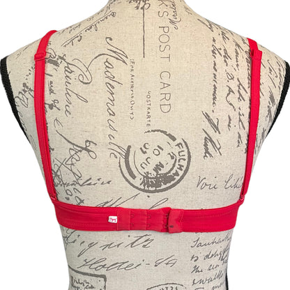 Back of red bra with black mark