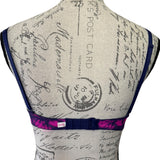 Back of black pink 32c bra