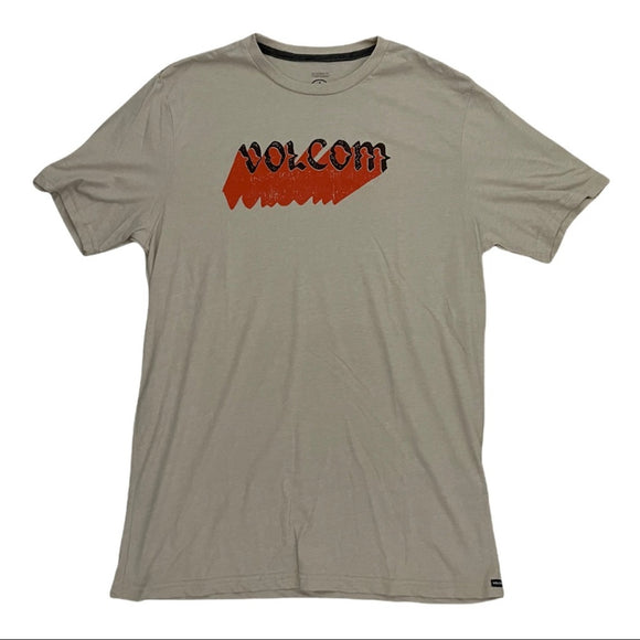 Beige t-shirt with red and black Volcom logo on a white background
