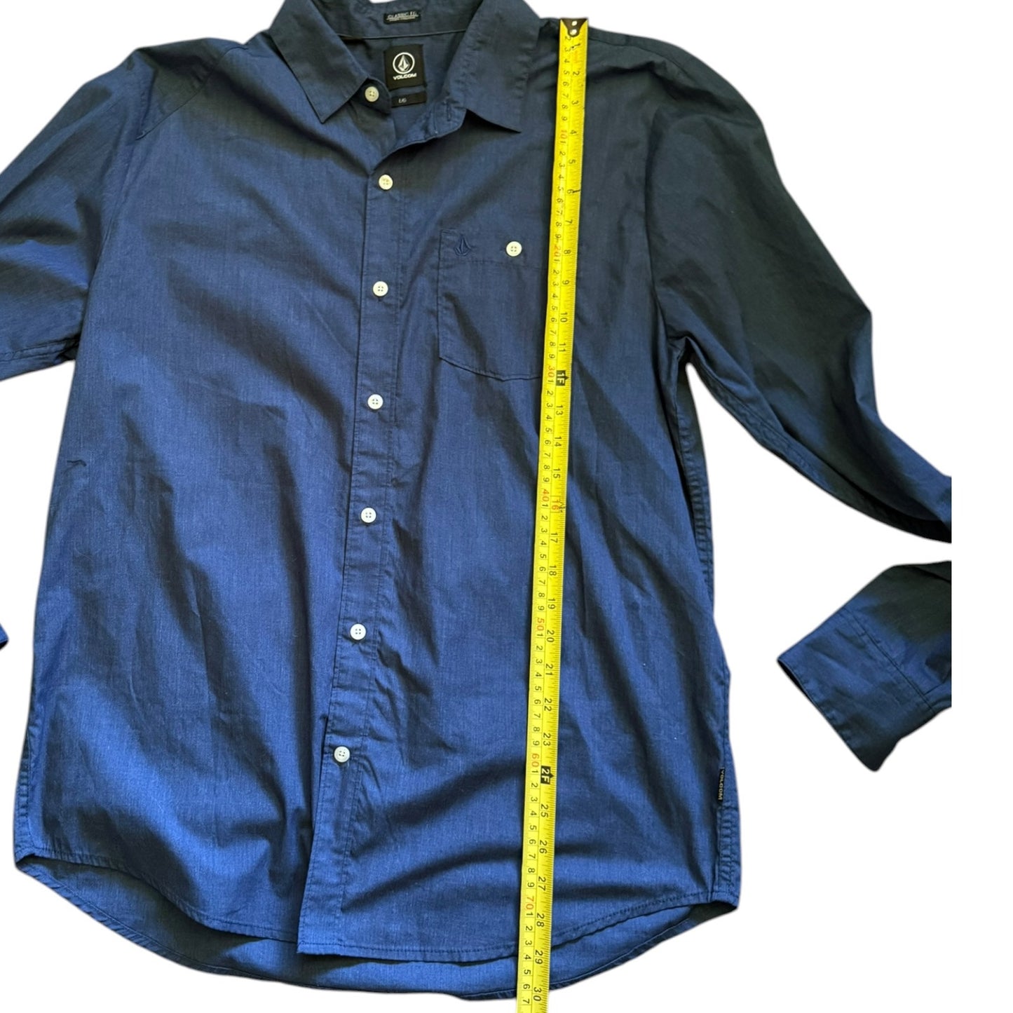 Blue shirt with a yellow measuring tape on a white background