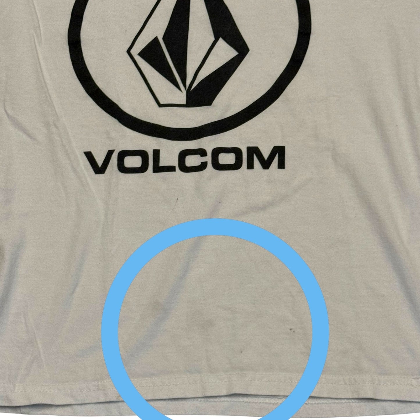 White t-shirt with Volcom logo showing issues