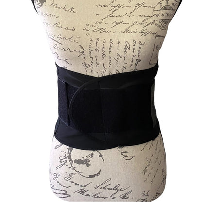 Black waist support belt on a mannequin with a vintage-style background