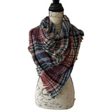 Plaid scarf on a mannequin with a white background