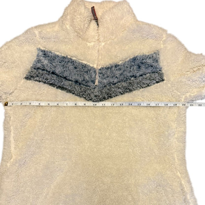 White fleece jacket with gray accents and a measuring tape for size reference on a white background