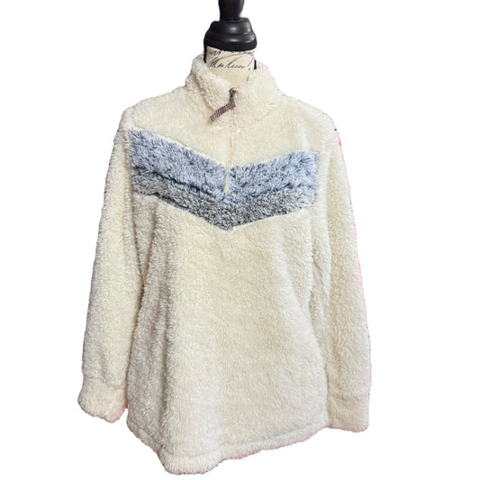White fleece pullover with blue gradient design on a mannequin against a white background