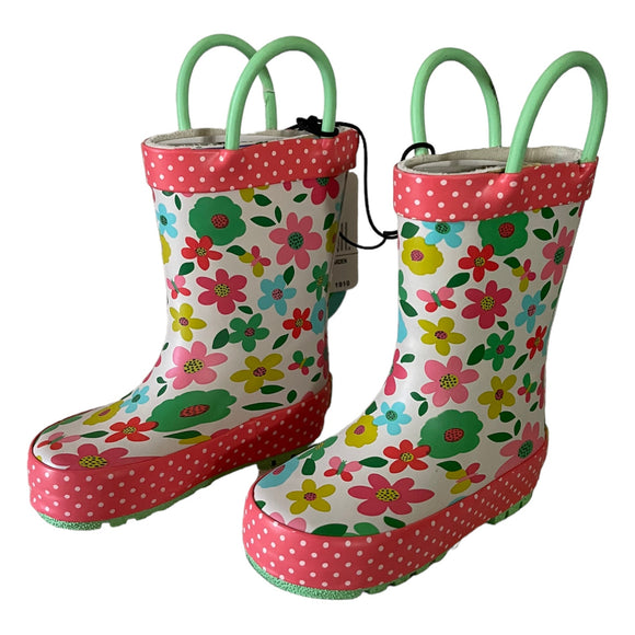 Colorful floral-patterned rain boots with pink polka dot trim on a white background