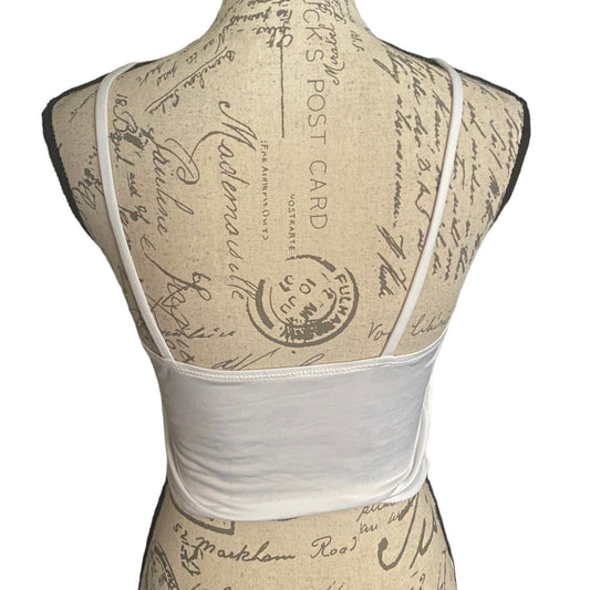 White tank bra back on a mannequin with vintage-style script design