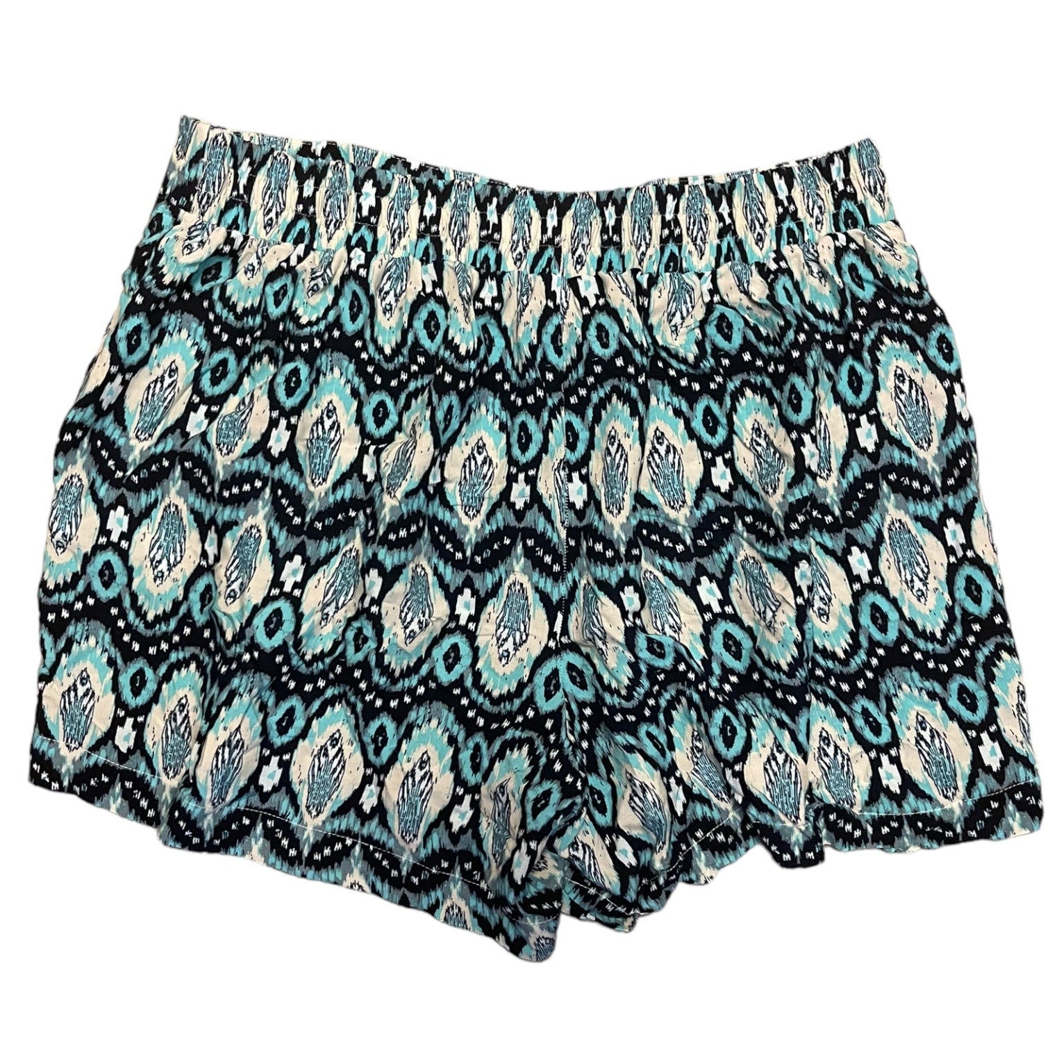 A pair of women's shorts featuring an all-over geometric ikat pattern on a white back grounf