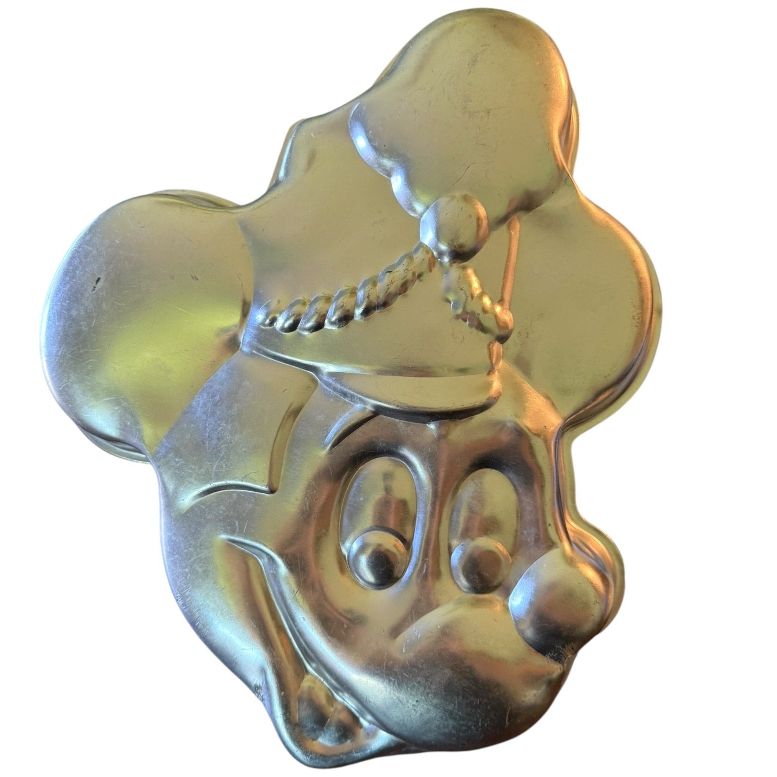 Silver Mickey Mouse head cake pan on a white background