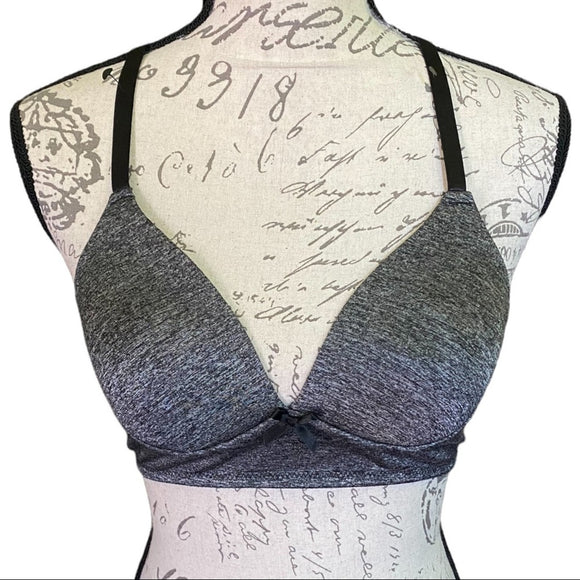 Front of Gray bra on a mannequin with a script patterned back