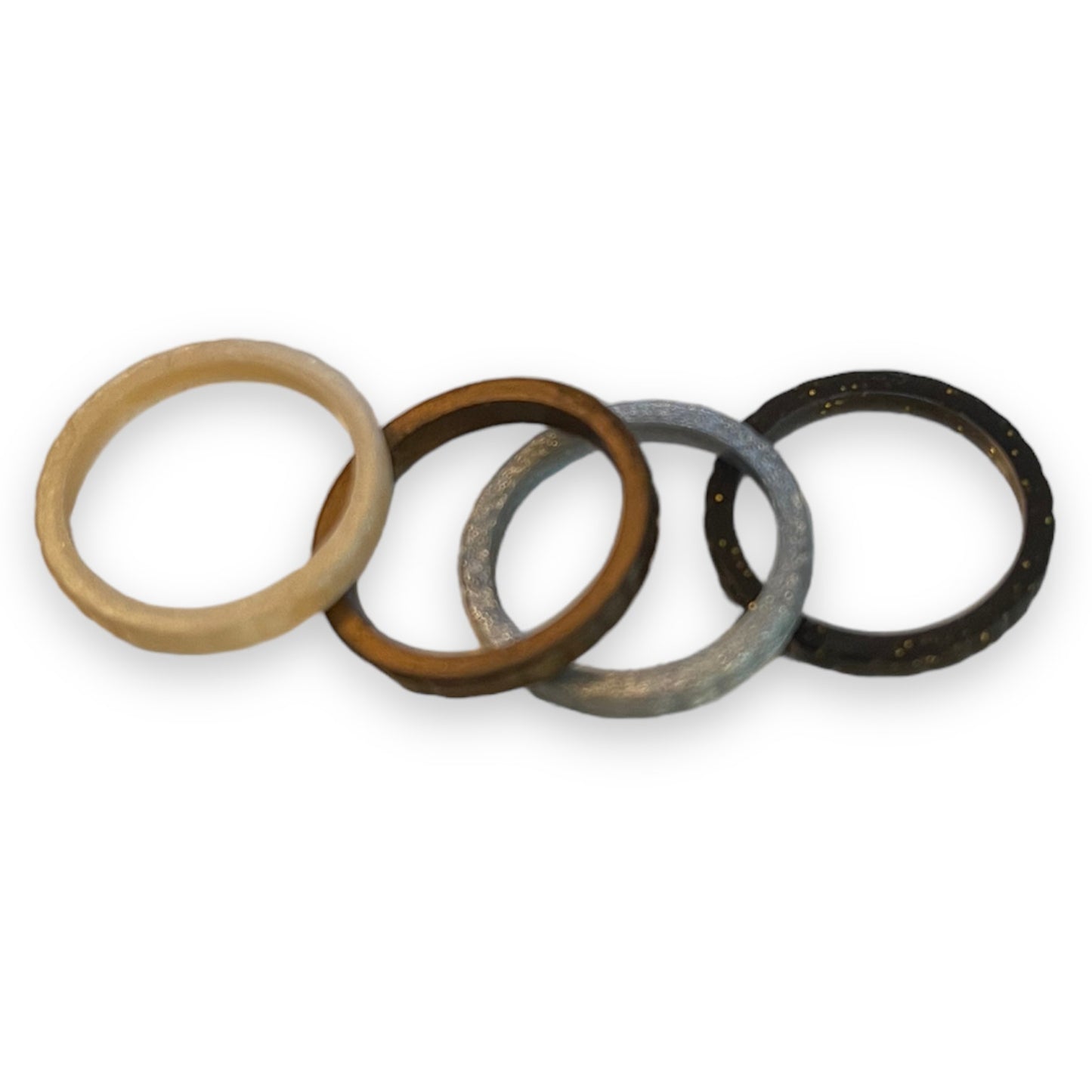 Four rings of different colors on a white background