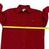 Pit to pit of red shirt