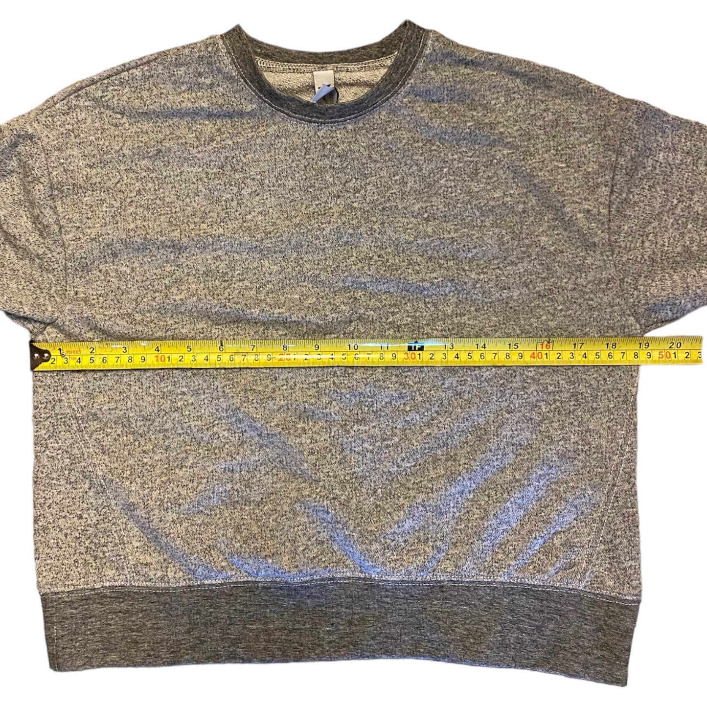 Pit to pit on sweater